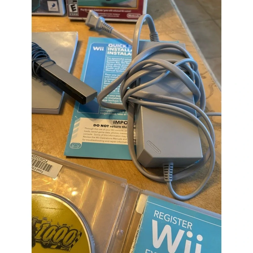 Nintendo Wii. Rare blue limited edition console bundle with Wii box. Many games